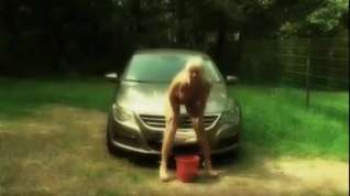 Online film Blonde girl washes a car and masturbates