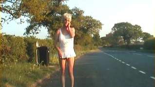 Online film Mature shemale walking on a road