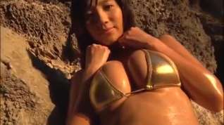 Online film Asian Babe on the beach