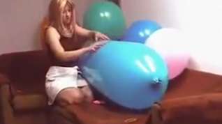 Online film Riding a blue zeppelin shaped balloon till pop