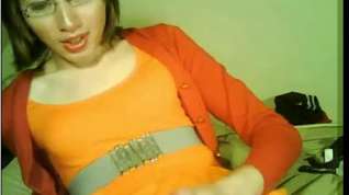 Online film Lonely tranny in orange jerks for webcam
