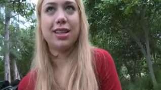 Online film girl blows in a public park