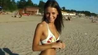 Online film This girl nudist strips bare at a public beach