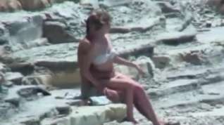 Online film  immature lovers couple on beach