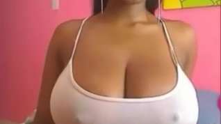 Online film Ebony slut shows her large tits on webcam