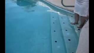 Online film Corpulent granny in nylons plays in the pool