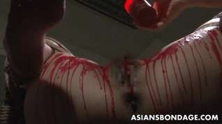 Online film Asian babe get her privates covered in wax.