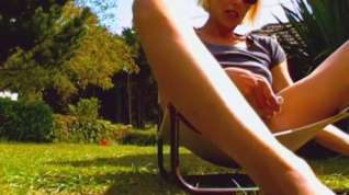 Online film French babe masturbating her slit in the backyard