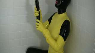 Online film Girl in yellow spandex uniform has orgasm in bathroom