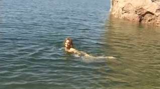 Online film Cute youthful brunette hair disrobes by the water and goes slim dipping