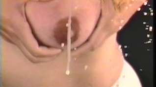 Online film Lactating bitch squeezes milk from her big billibongs