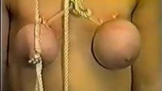 Online film Slave girl gets her breasts tortured with ropes